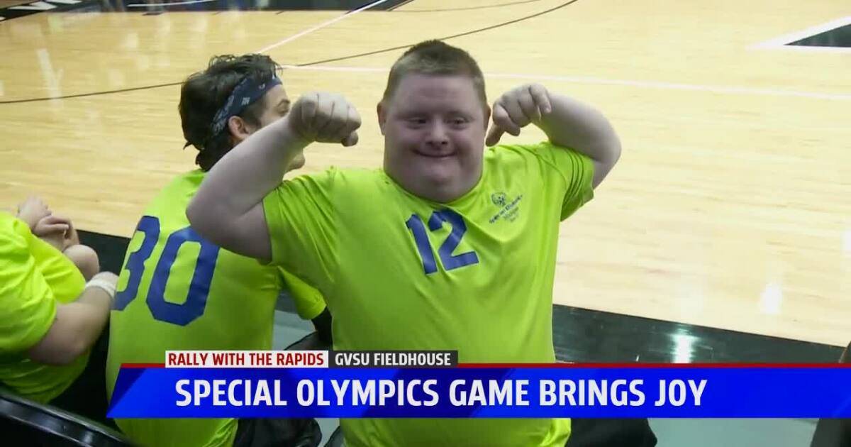 Special Olympian posing, link to Fox17 News Article